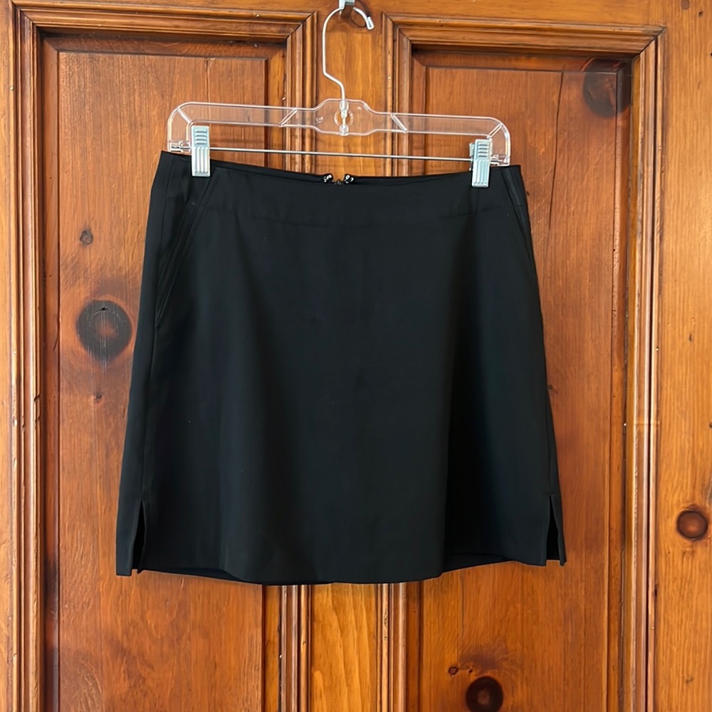 Thigh-high black golf skort
